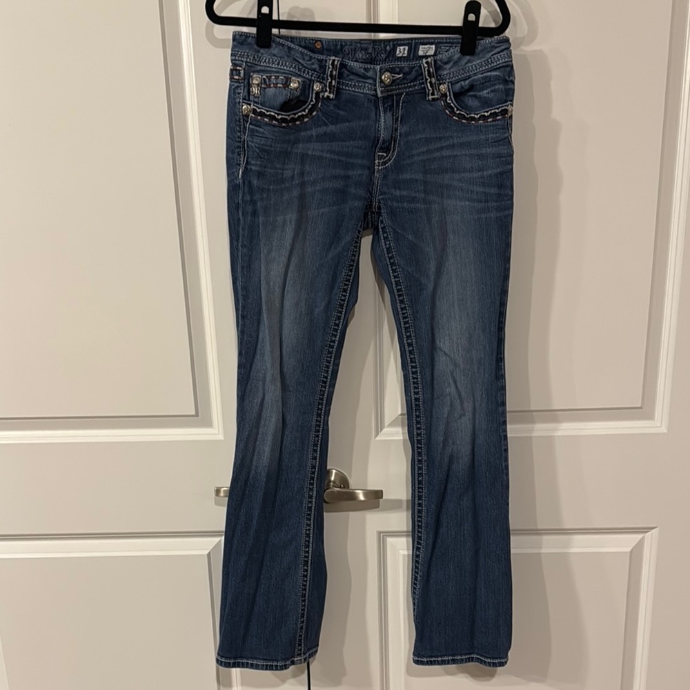 Lightly worn Stylish Blue Denim Jeans Miss Me size 31 signature boot